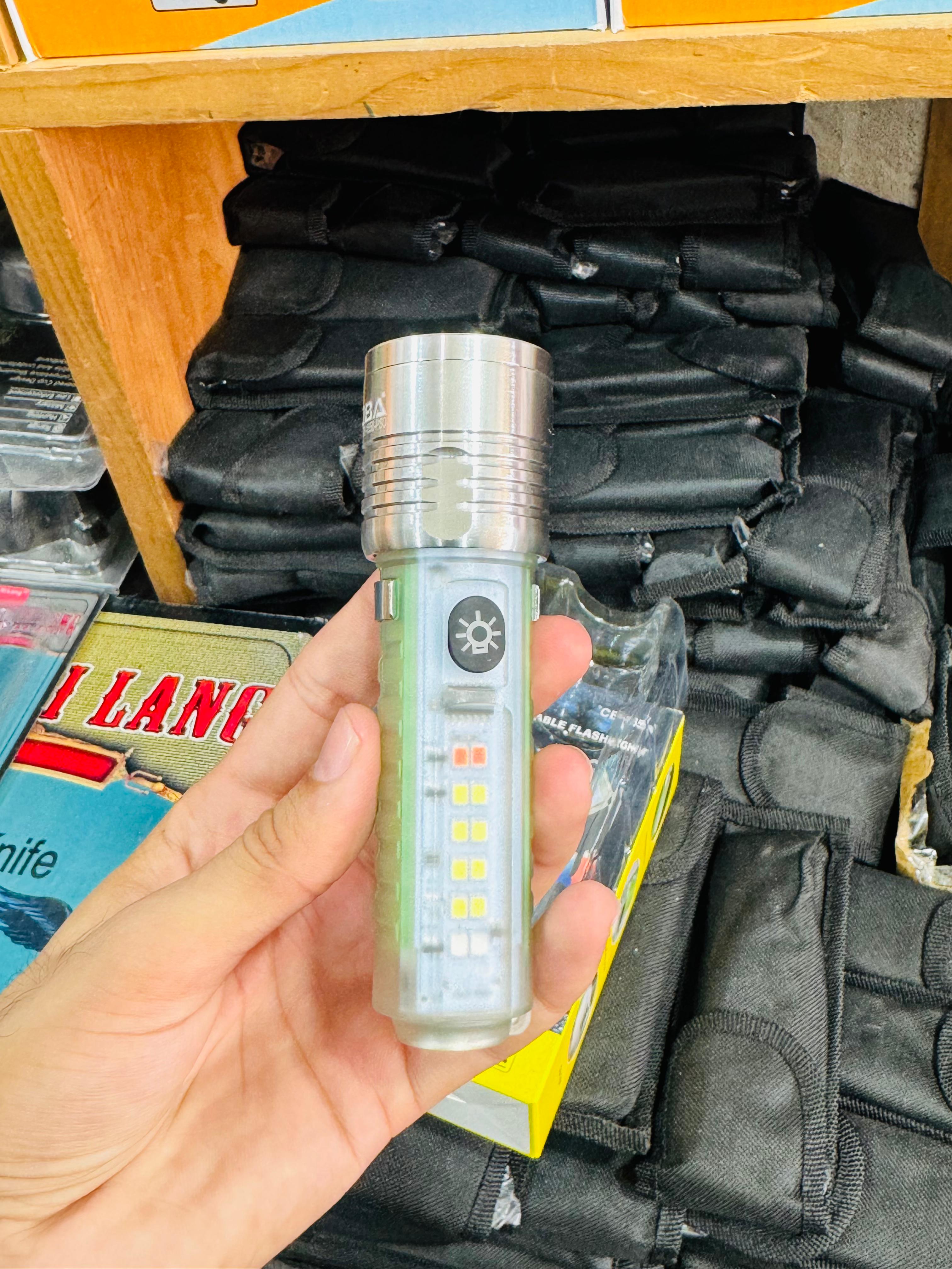 Coba Mini LED Torch Light - Coba CB 1658 â€“ Super Bright Handheld Tactical LightÂ  | Multiple Modes | Zoom-able Electric Flashlight for Camping, Hiking &amp; Cycling ( Random Color )