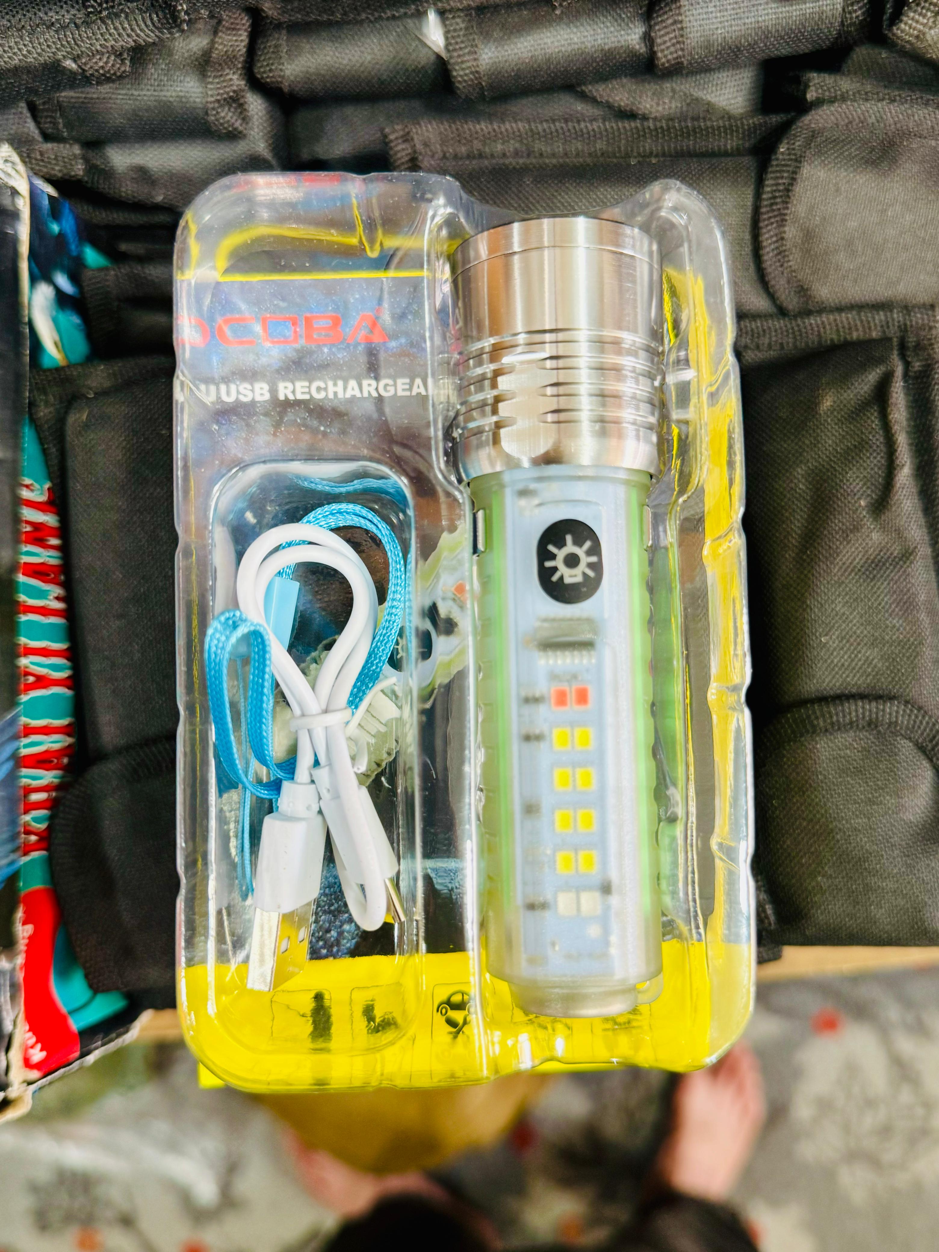 Coba Mini LED Torch Light - Coba CB 1658 â€“ Super Bright Handheld Tactical LightÂ  | Multiple Modes | Zoom-able Electric Flashlight for Camping, Hiking &amp; Cycling ( Random Color )